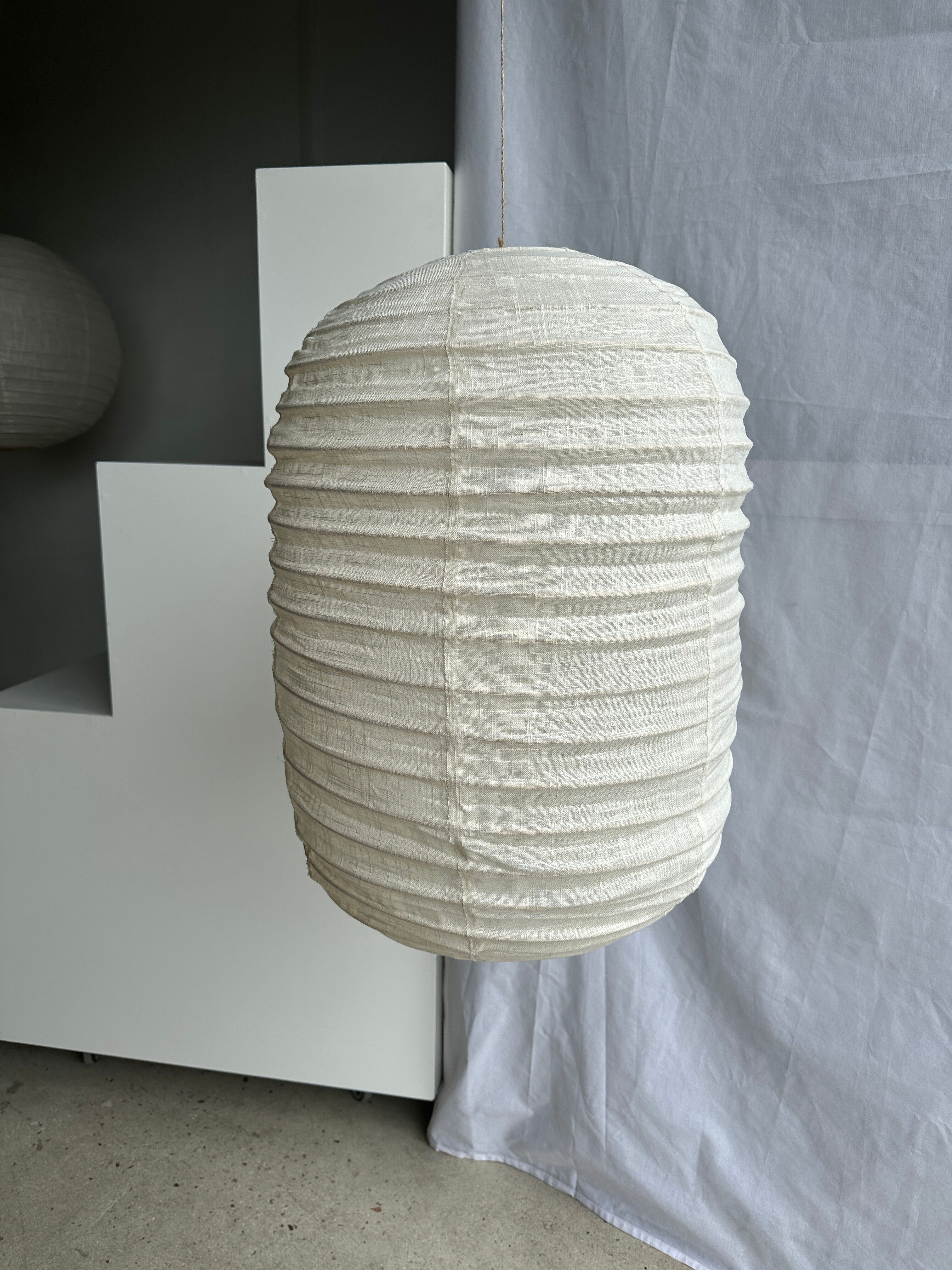 Suspension in rattan and natural japanese linen lantern shape h70 d50
