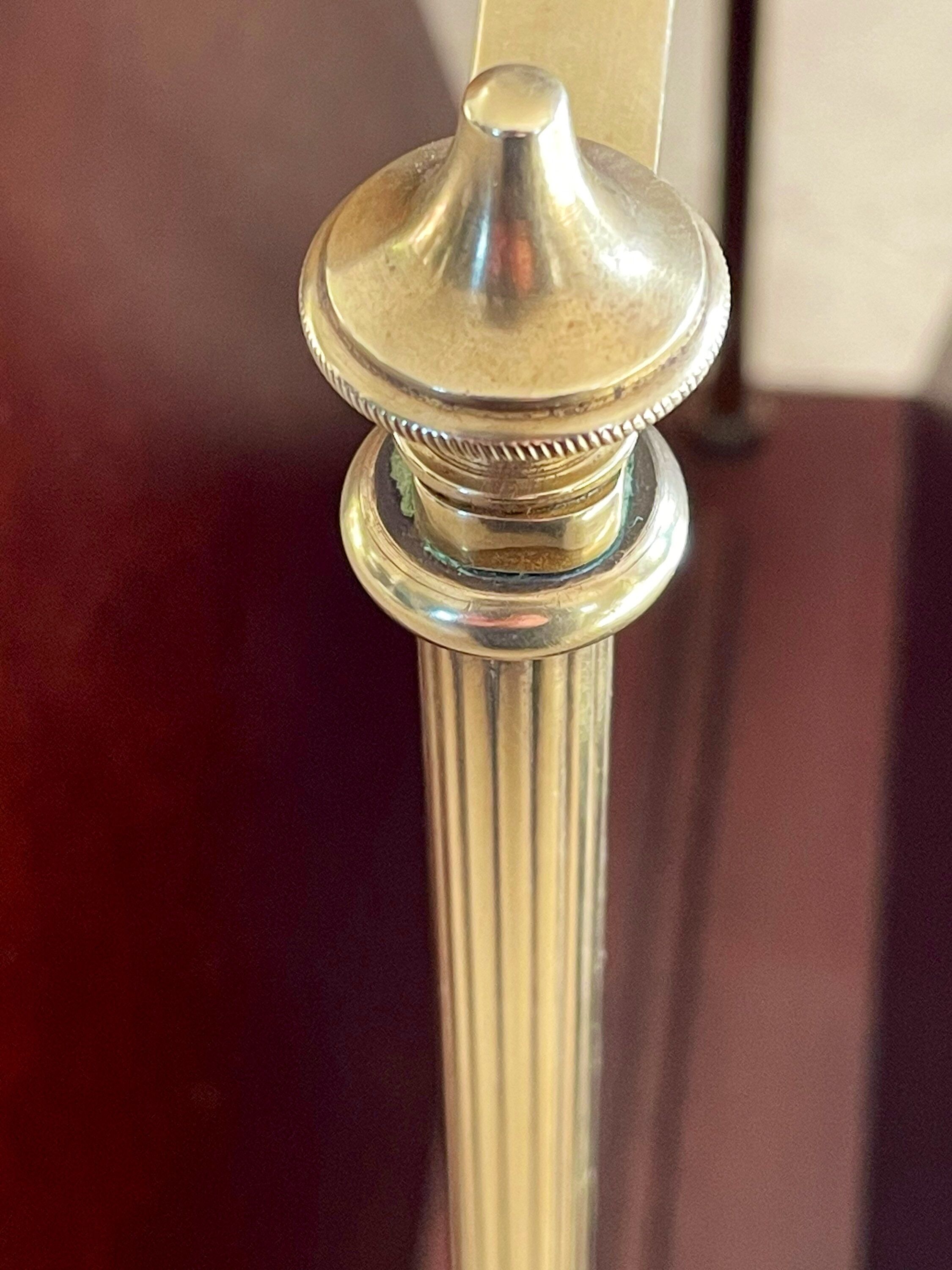 Magazine racks with claw feet by Maison Jansen