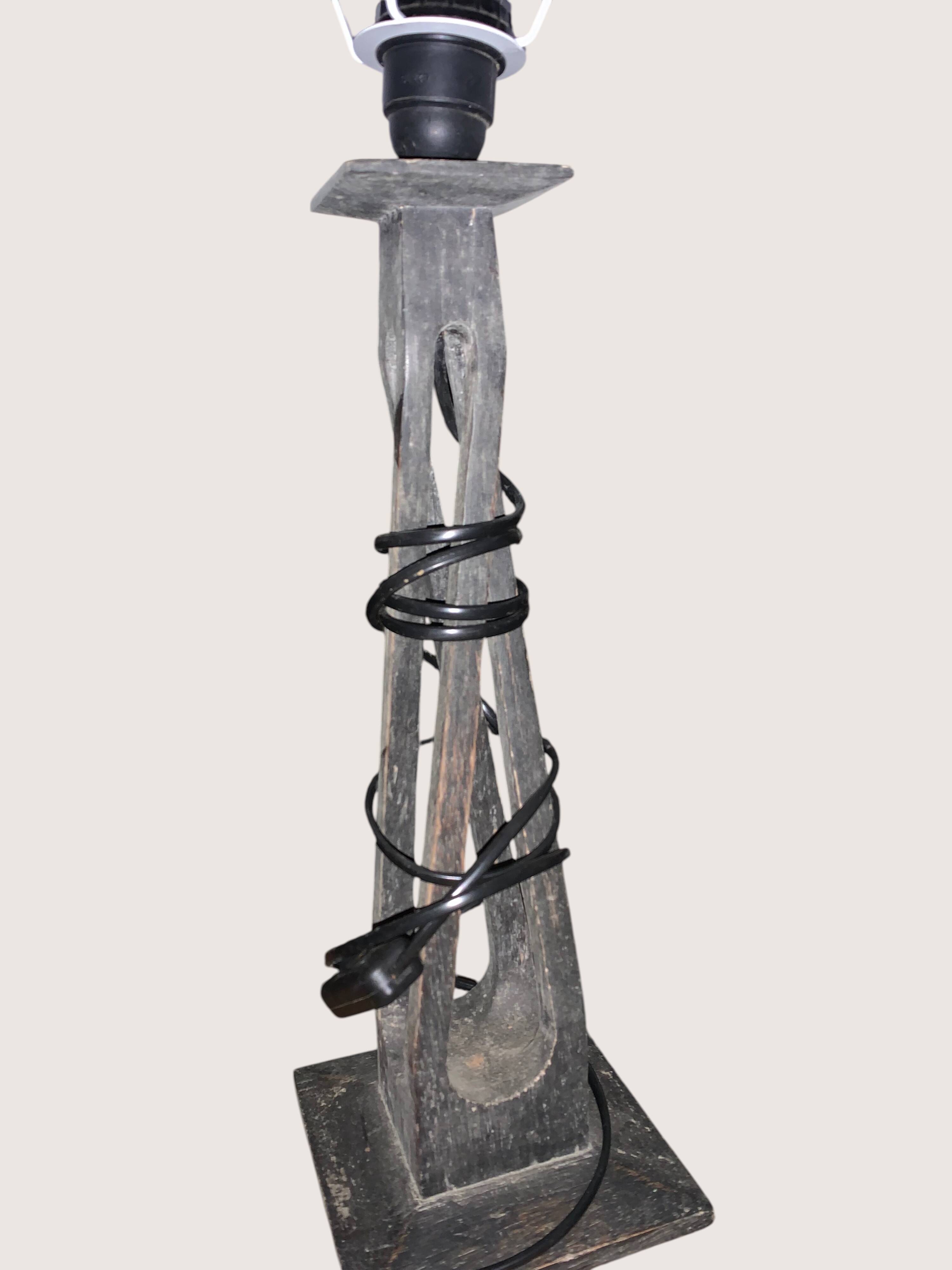 Pair of lamps carved in teak