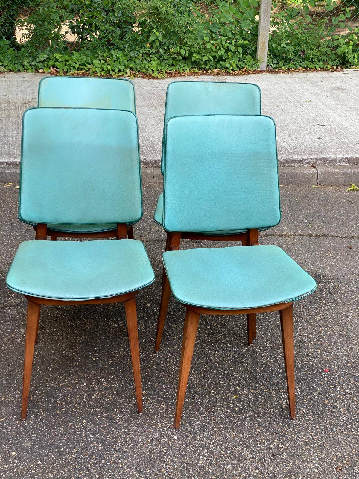 4 Scandinavian dining chairs in solid wood and blue-green leather from the 1950s.