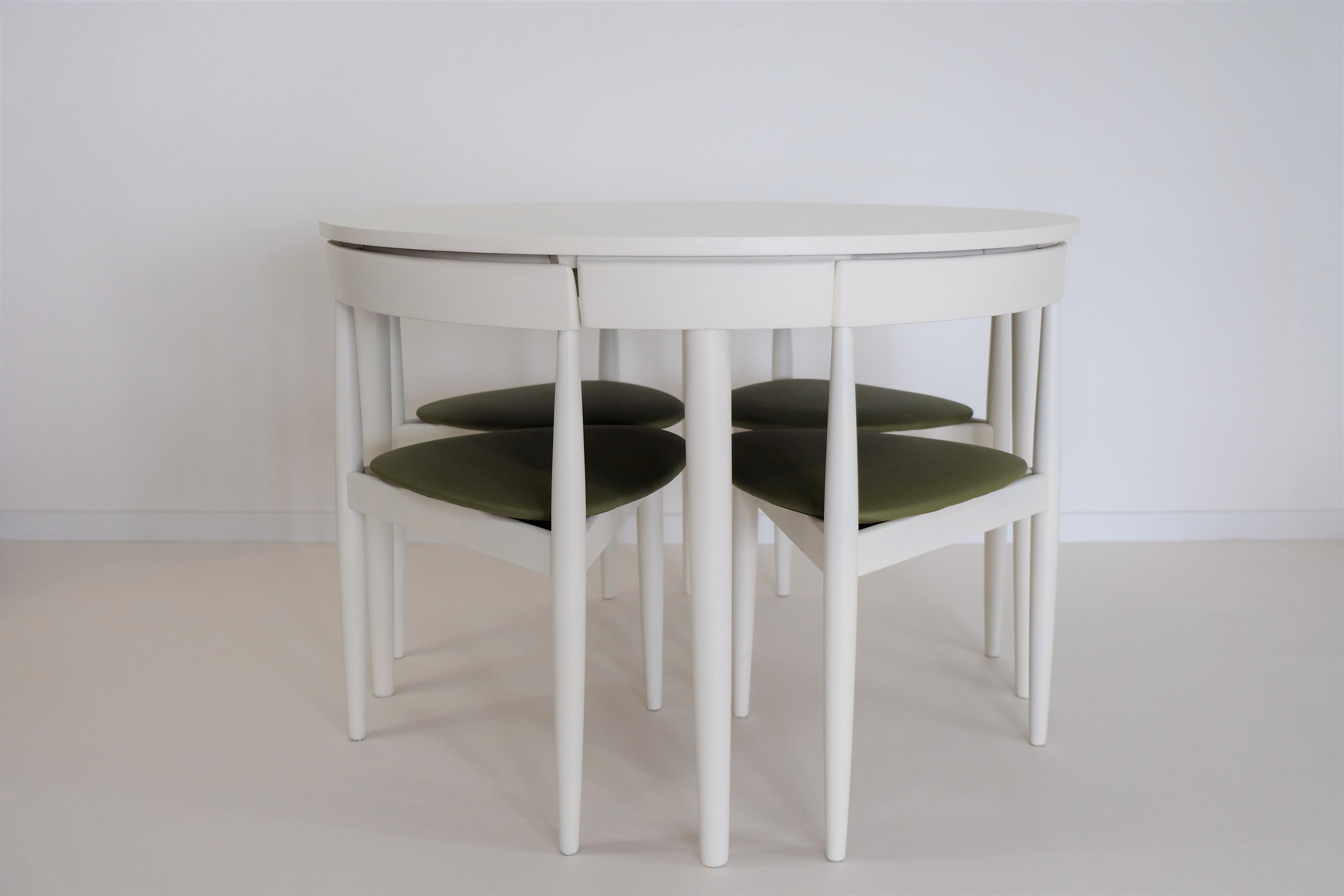 Table and chairs by Hans Olsen