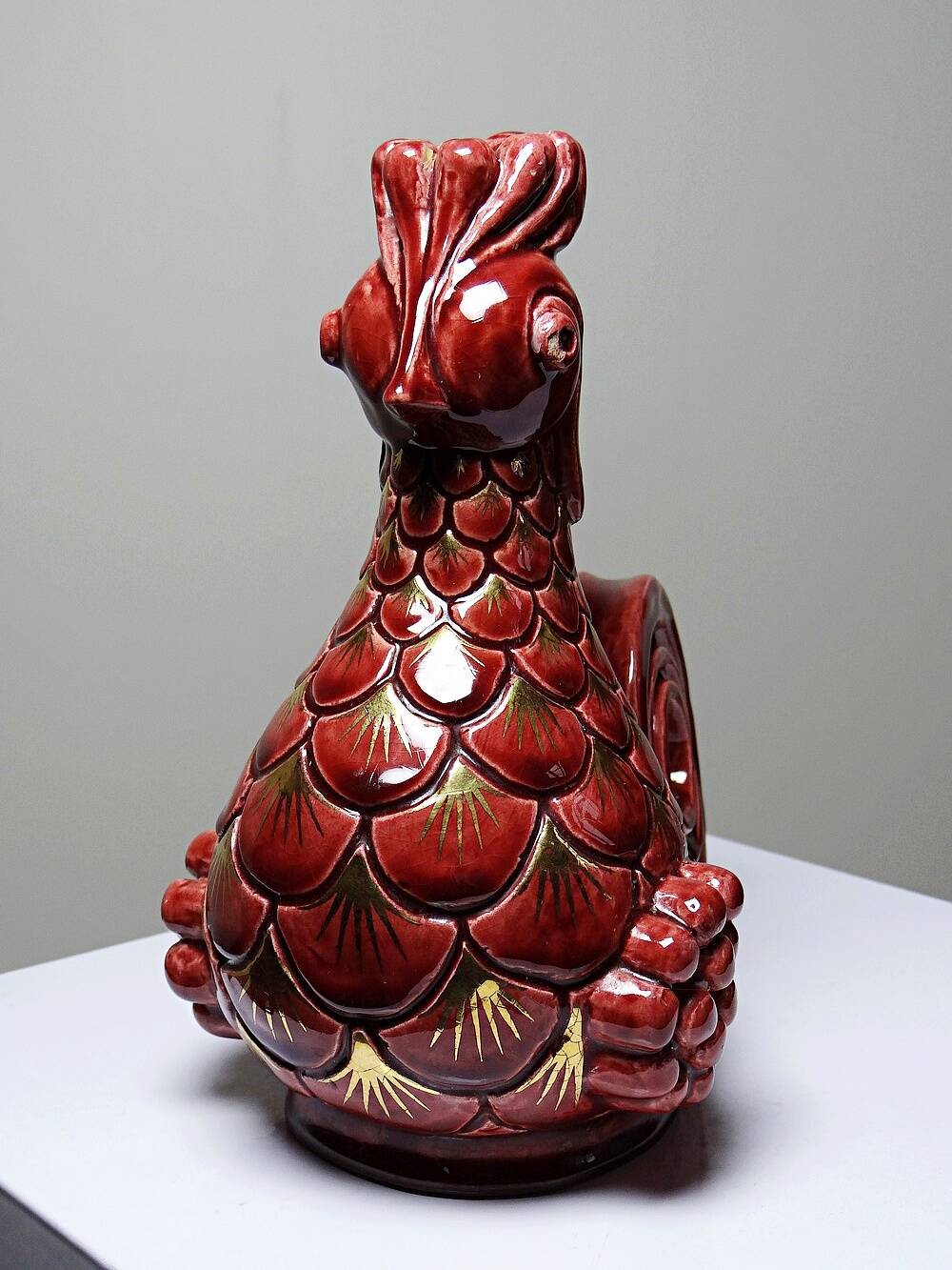 Pair of ceramic glazed candlesticks in the shape of roosters, signed A.G Roger, year 1948.