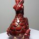 Pair of ceramic glazed candlesticks in the shape of roosters, signed A.G Roger, year 1948.
