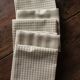 Lot 6 gingham cotton napkins and beige linen tiles