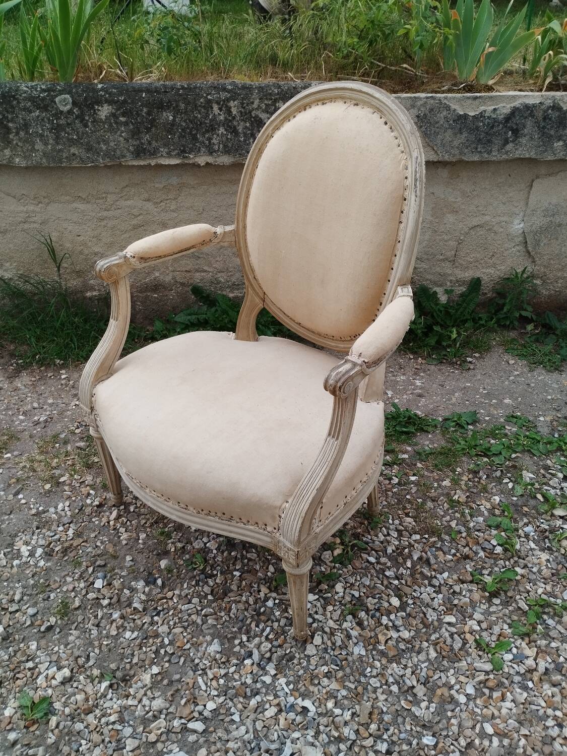 Antique armchair in Louis XVI style, 19th century.