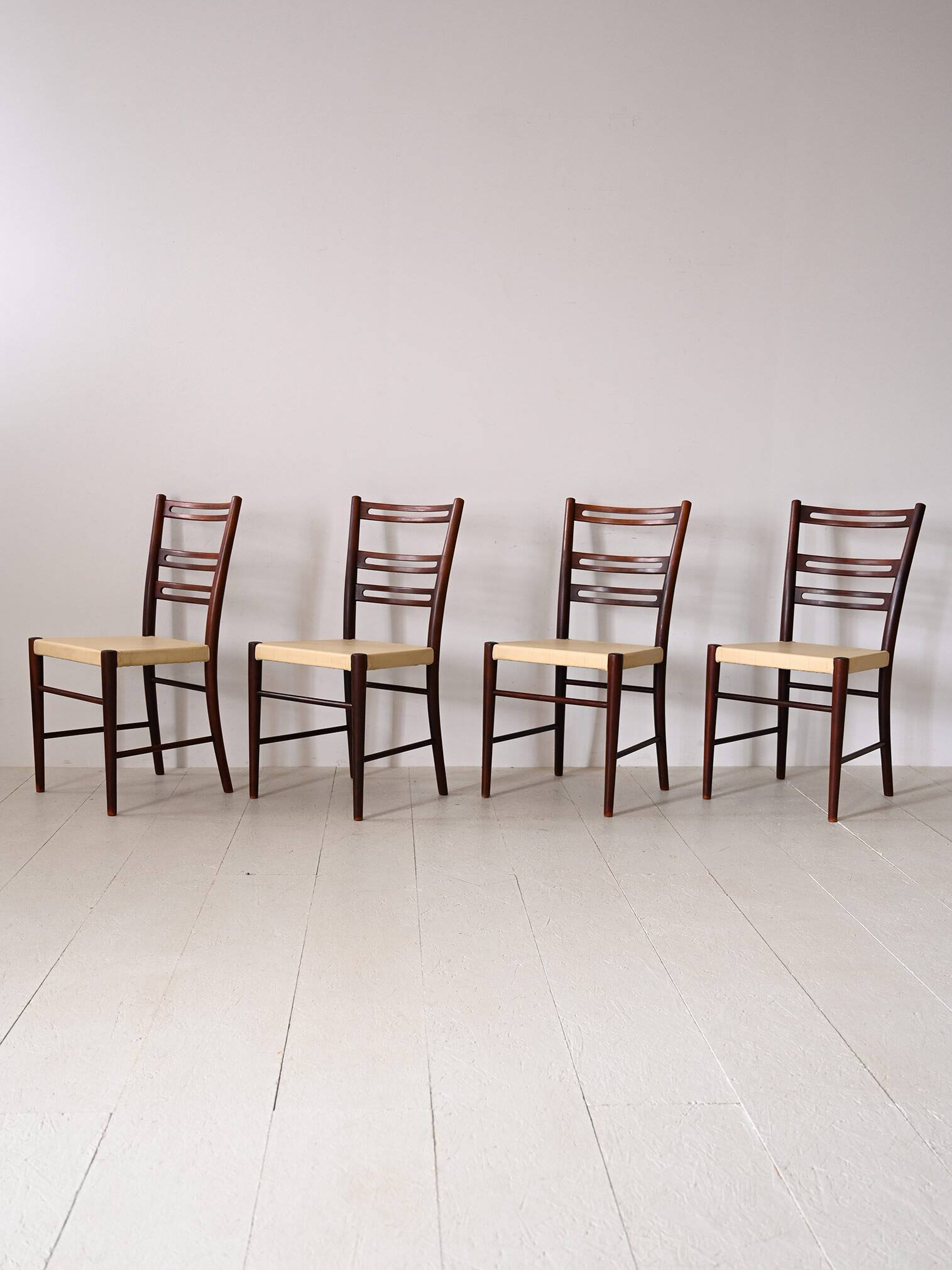 Scandinavian chairs in wood and leather