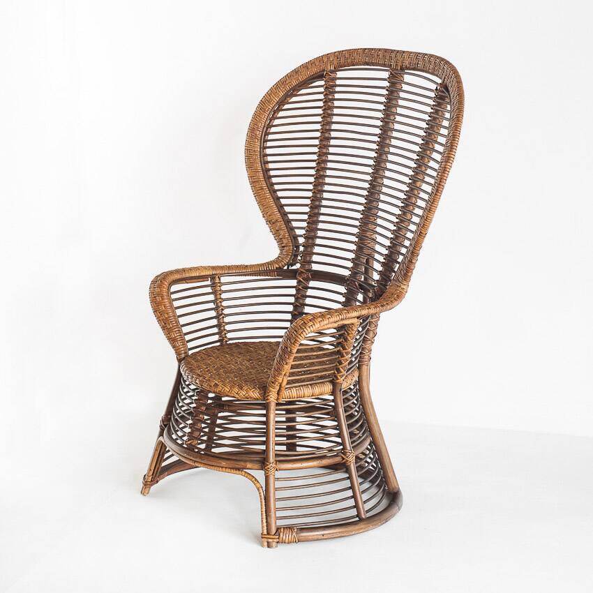 Vintage high armchair in cane/rattan. France, 1960s