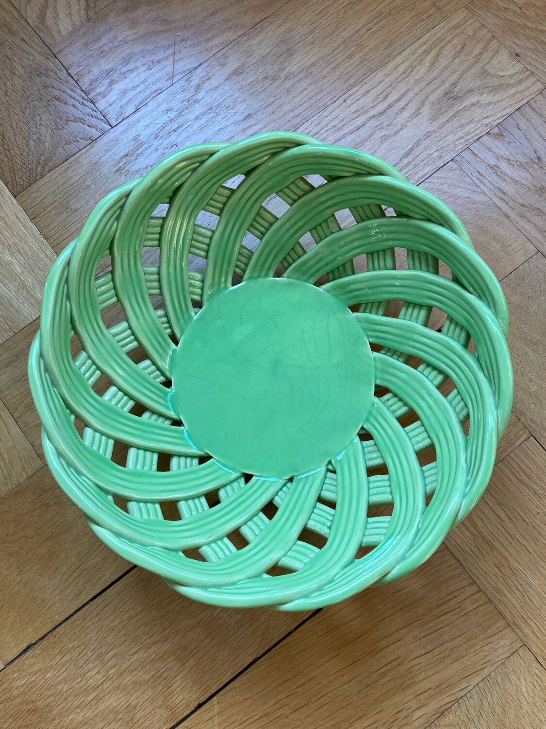 Green woven ceramic basket