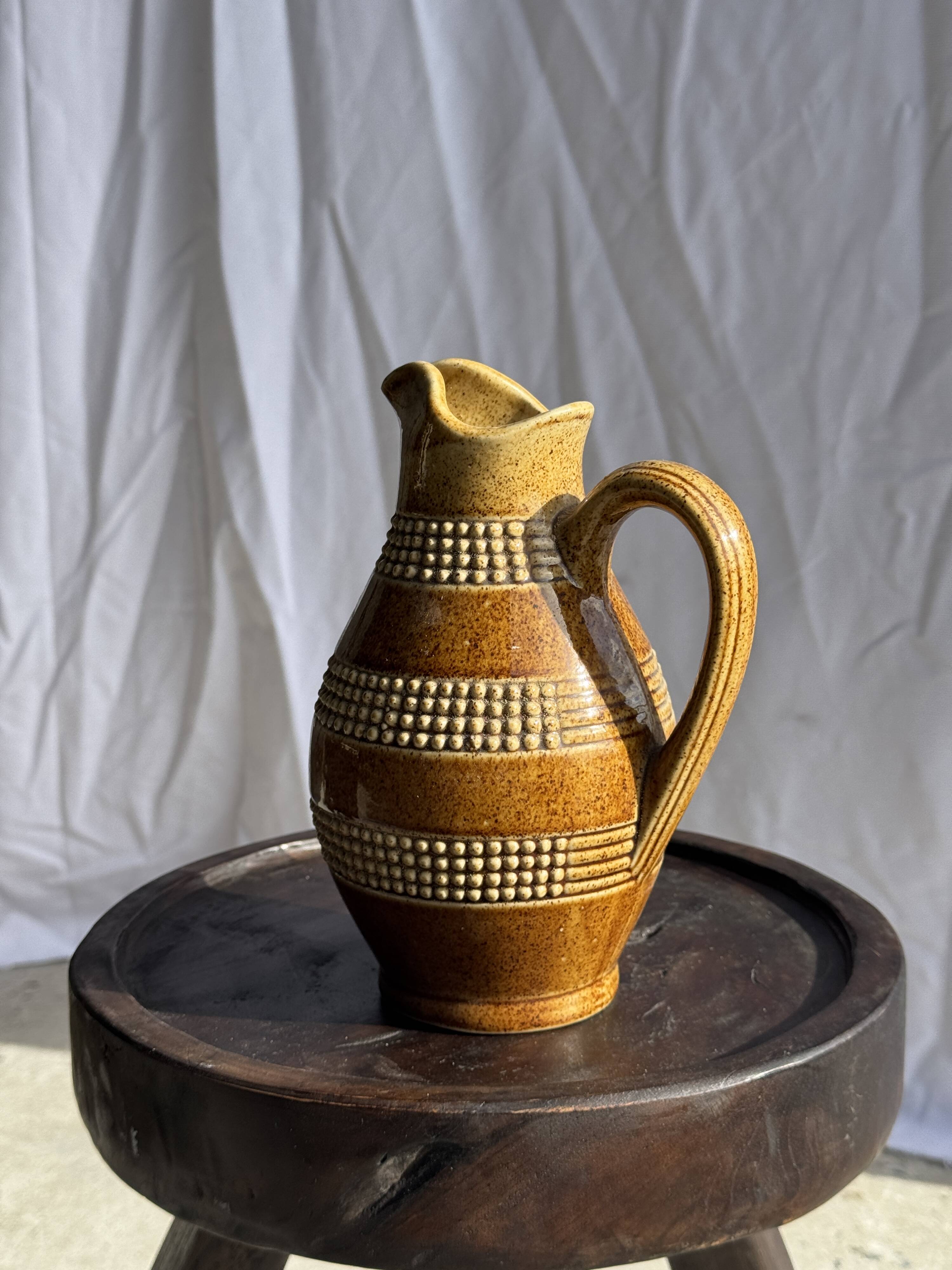 Vintage yellow stoneware carafe with beaded friezes Made in France H22