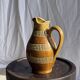 Vintage yellow stoneware carafe with beaded friezes Made in France H22