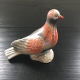 Antique bird in pearly ceramic
