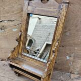 Antique barber's mirror in Burmese teak.