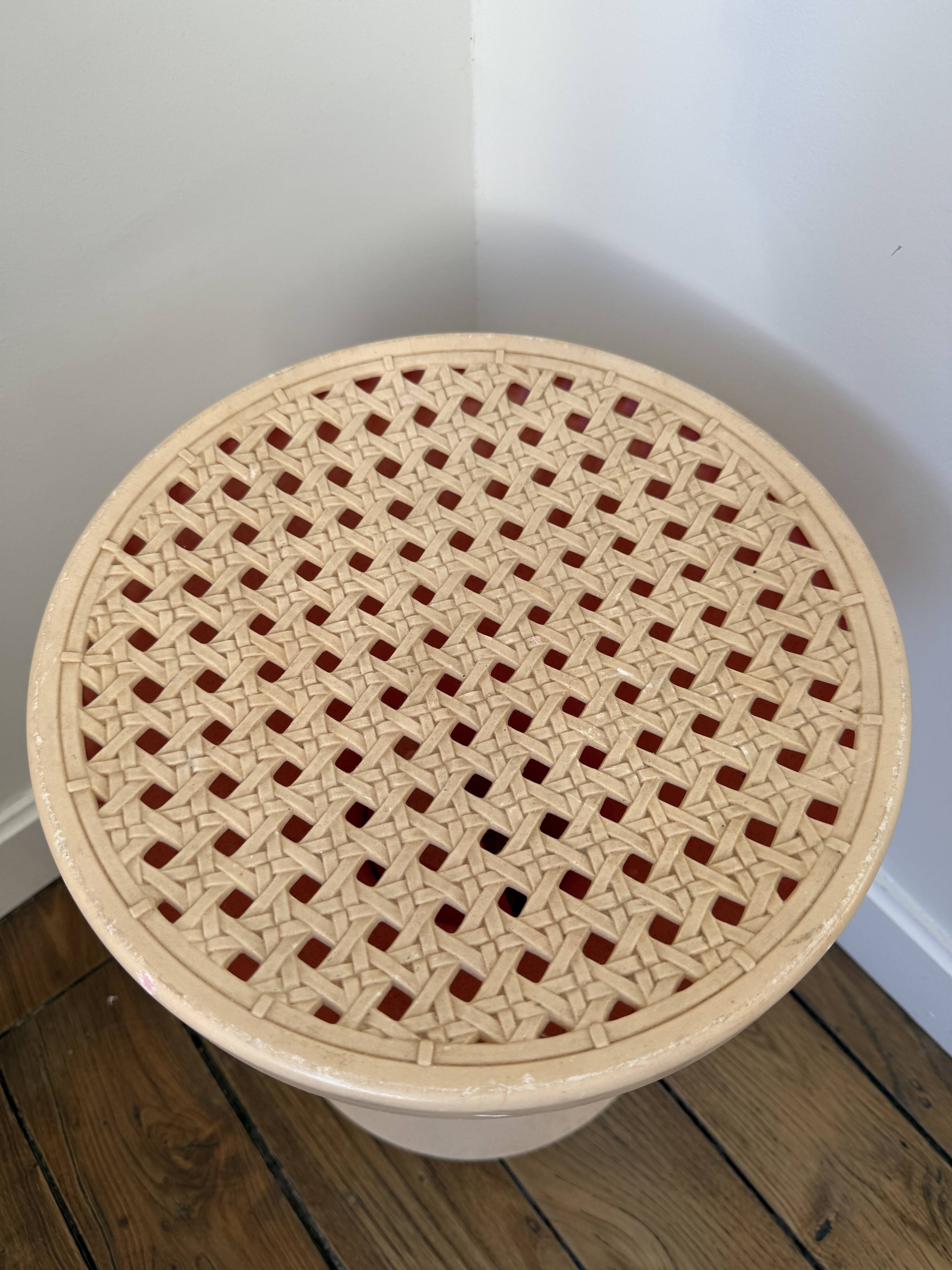 Tam Tam Stamp stool Made in France with a woven rattan-style seat.