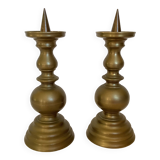 Pair of brass candlesticks with spikes