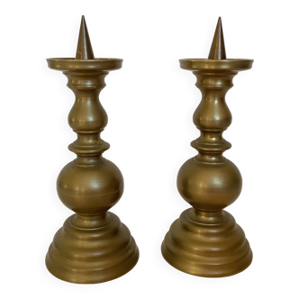 Pair of brass candlesticks with spikes