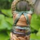 Glass and rattan carafe