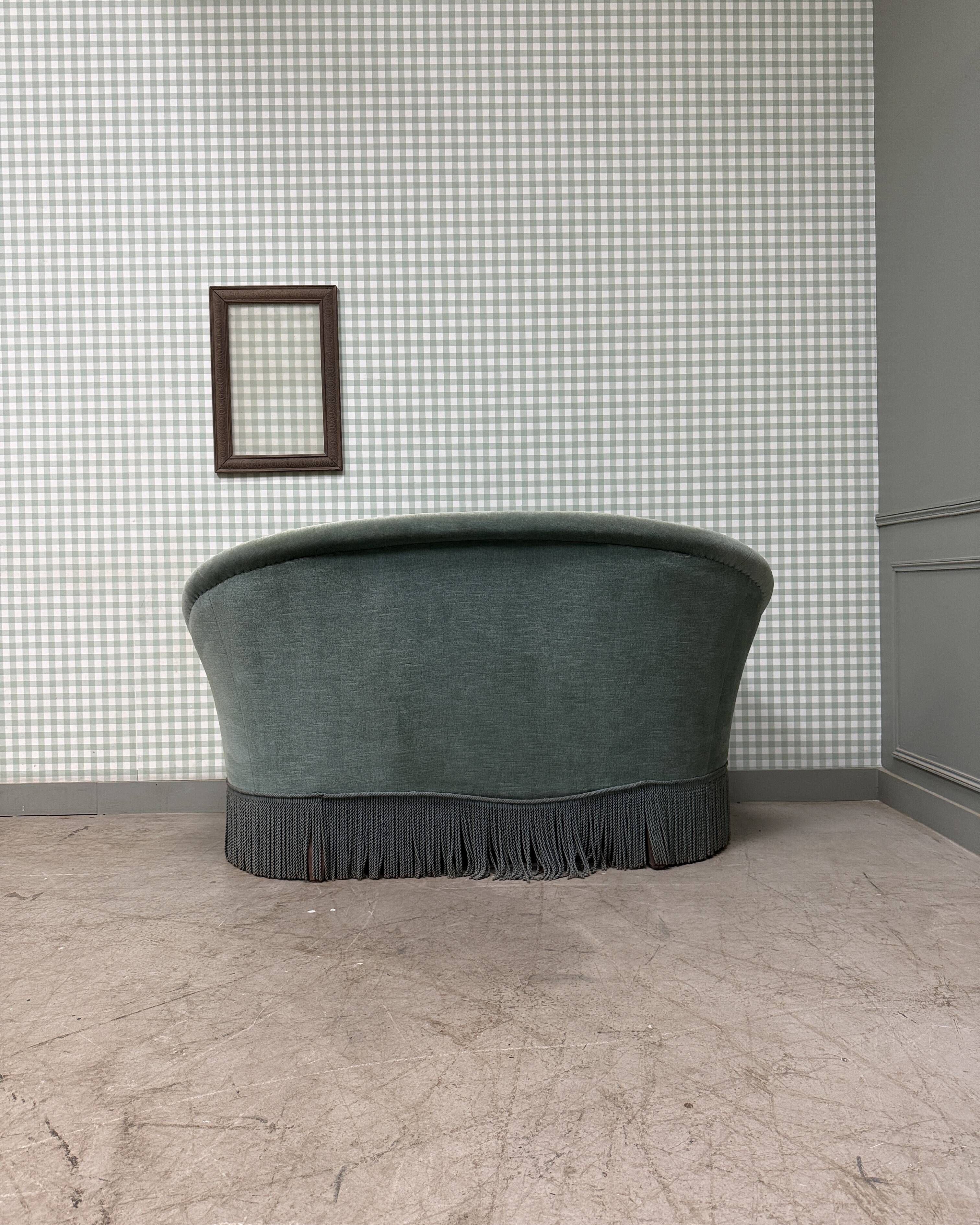 Green velvet toad sofa