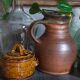 Pitcher traditional pottery Folk art in old enamelled sandstone