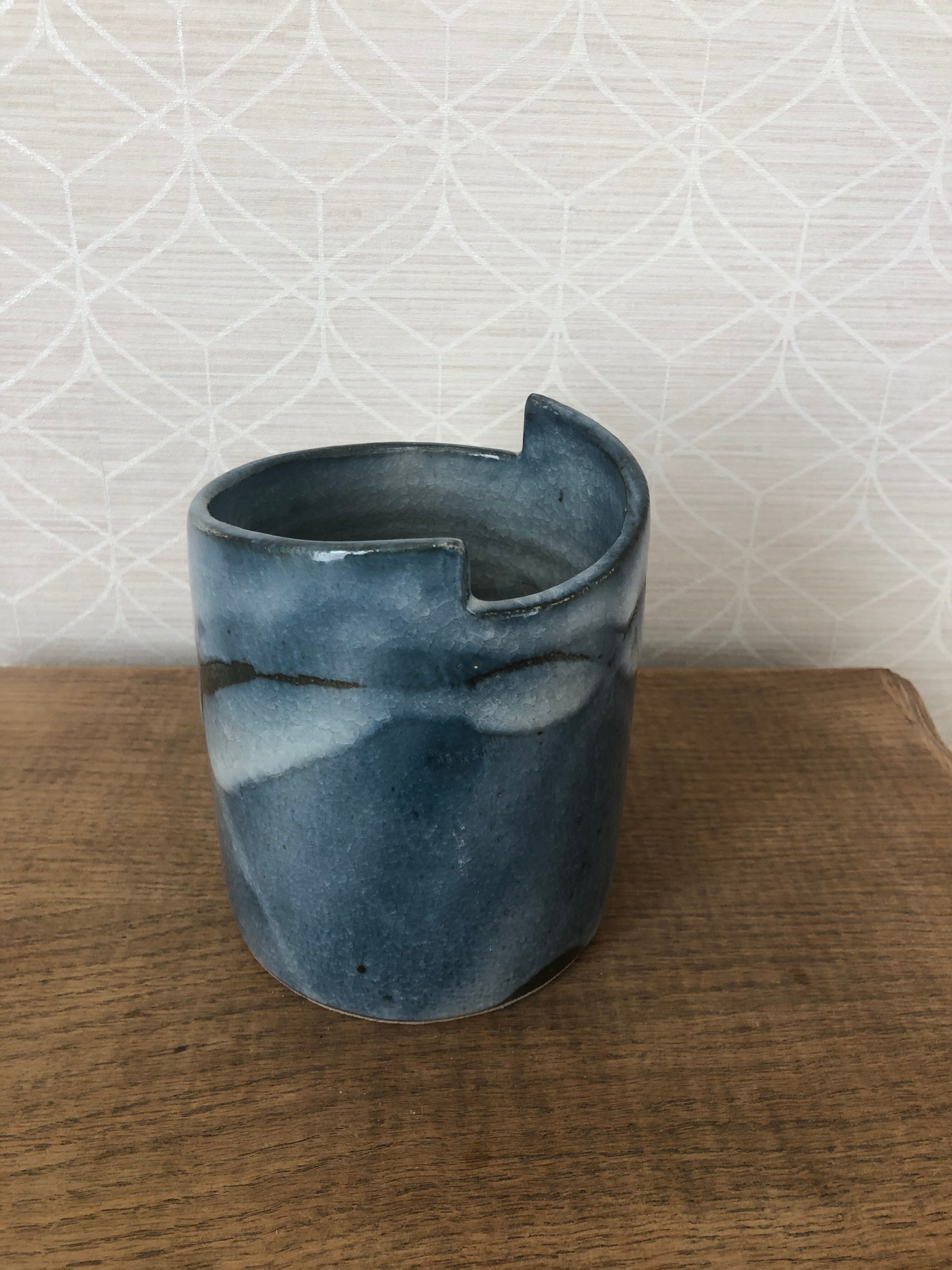 Vintage blue vase in varnished sandstone