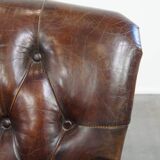 Classic grained cognac colored cowhide leather Chesterfield armchair