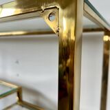 Old shelf in golden metal brass geometric library design 80s vintage