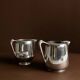 Two argent aluminium Art Nouveau sauce boats by Newmaid Picquot Ware, England 1950s - set of 2