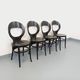 Set of 4 vintage Mouette chairs by Baumann in black wood from the 1960s.