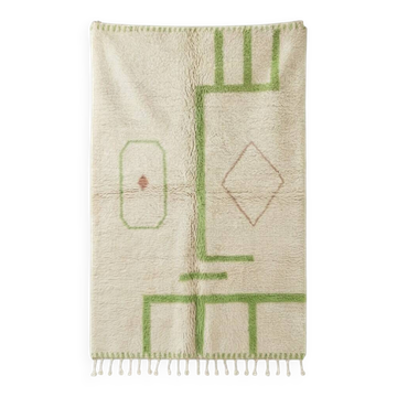 Moroccan rug in Azilal green tone.