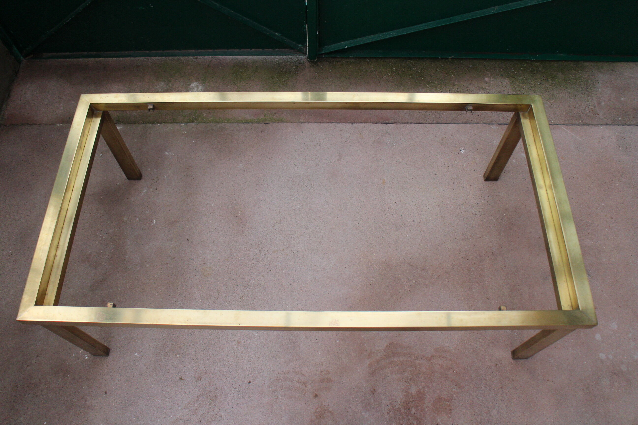Brass coffee table and 1970 smoked glass
