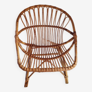 Shell rattan armchair