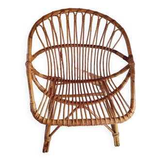 Shell rattan armchair