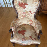 Violin-backed cabriolet armchair, in the Louis XV style.