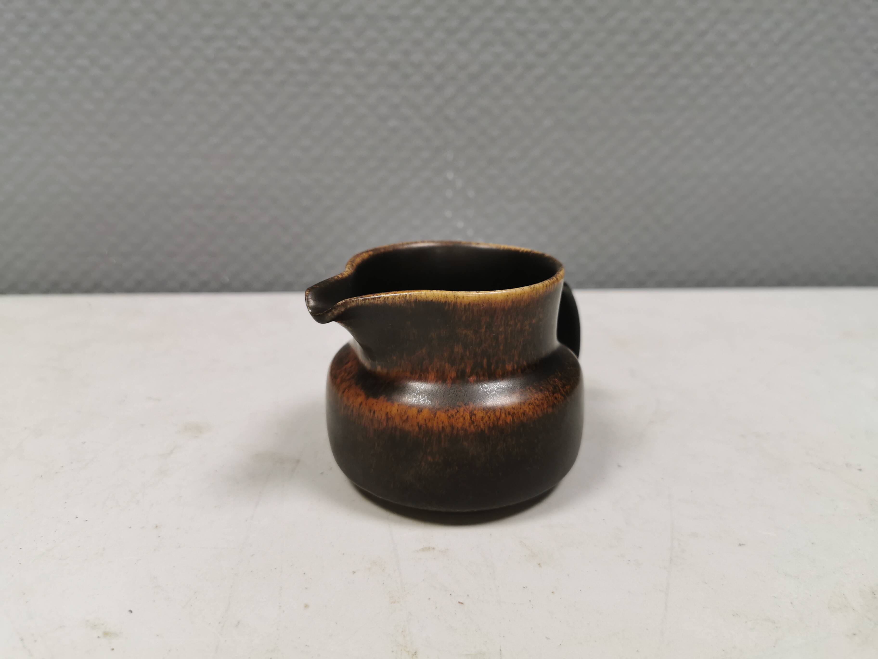 Very nice cream jug in hare fur glaze, Danish and from the 1970-80s.