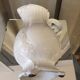 Pitcher has beautiful model beyerle niderviller black earth enamelled with white