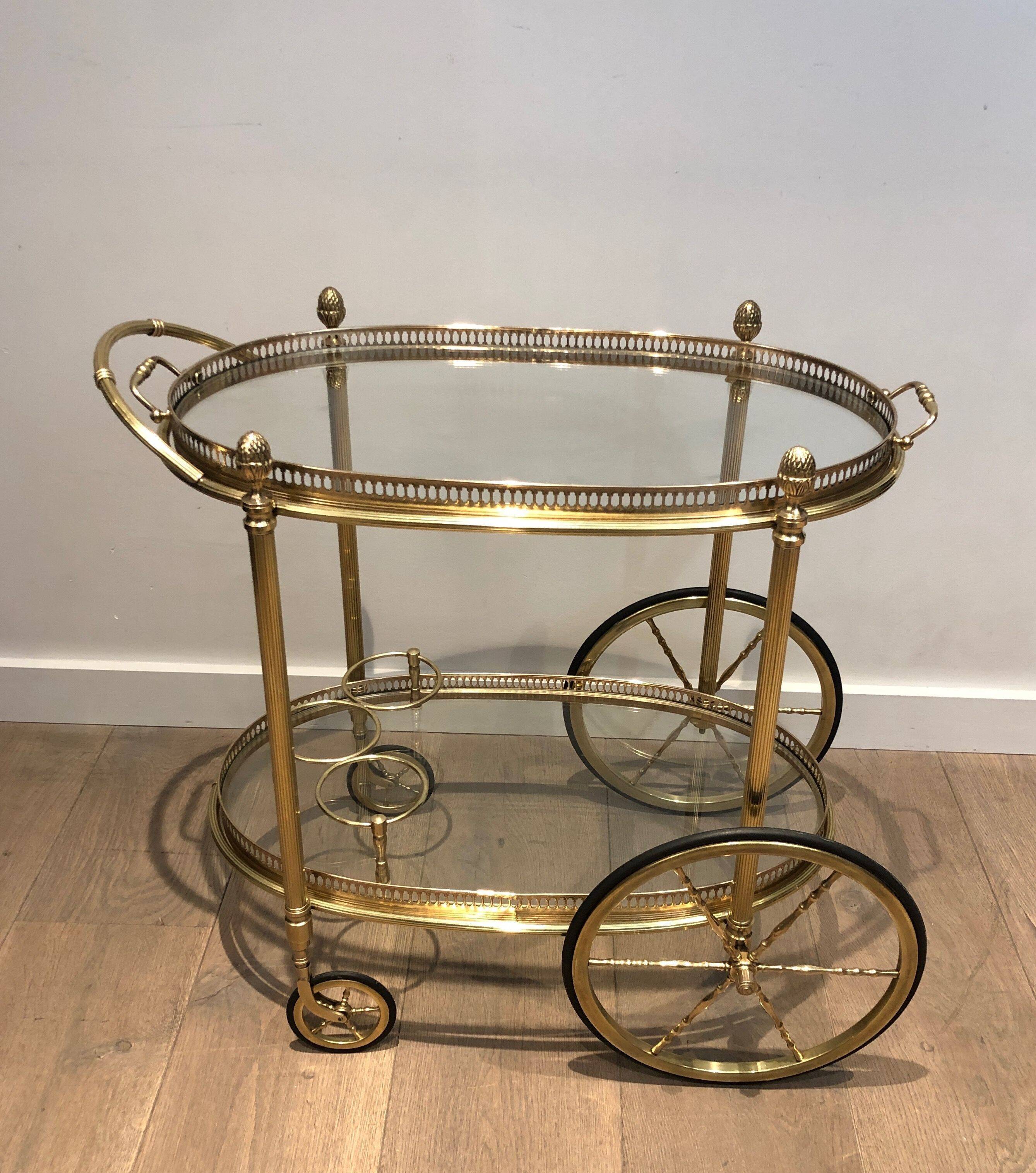Oval brass trolley from Maison Baguès.