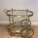 Oval brass trolley from Maison Baguès.