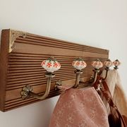 Vintage wall coat rack with 5 ceramic hooks featuring floral patterns - wood