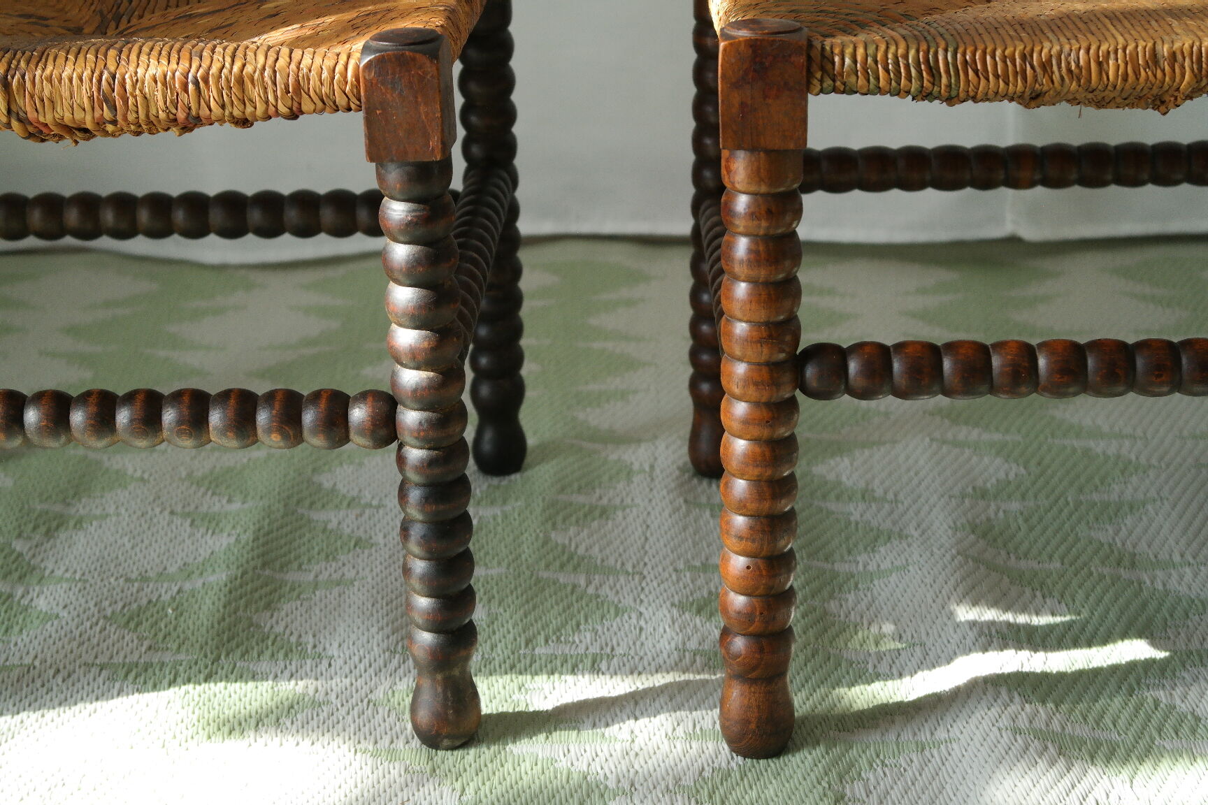 Pair of chairs corner fireplace turned beaded wood