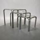 Set of 3 vintage chrome nesting tables with smoked glass.