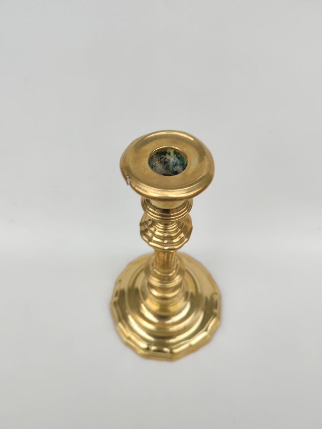 Pair of solid brass candlesticks, early 18th century.