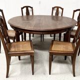 Art Deco table and six chairs in solid walnut, 20th century.