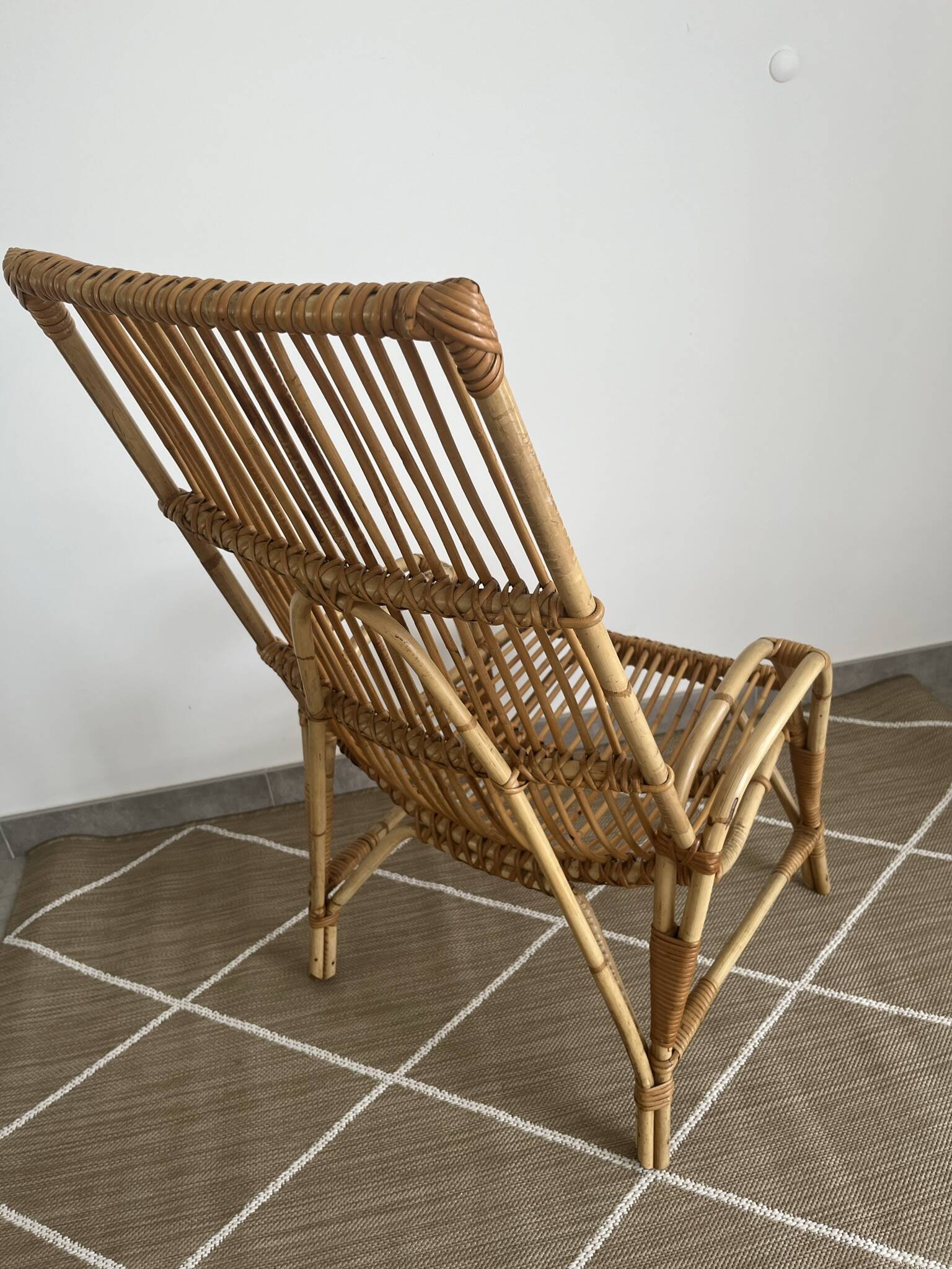 Large rattan armchair