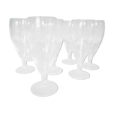 Eight champagne flutes in engraved glass