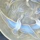 Verlys, iridescent glass cut with a design of geese and fish.