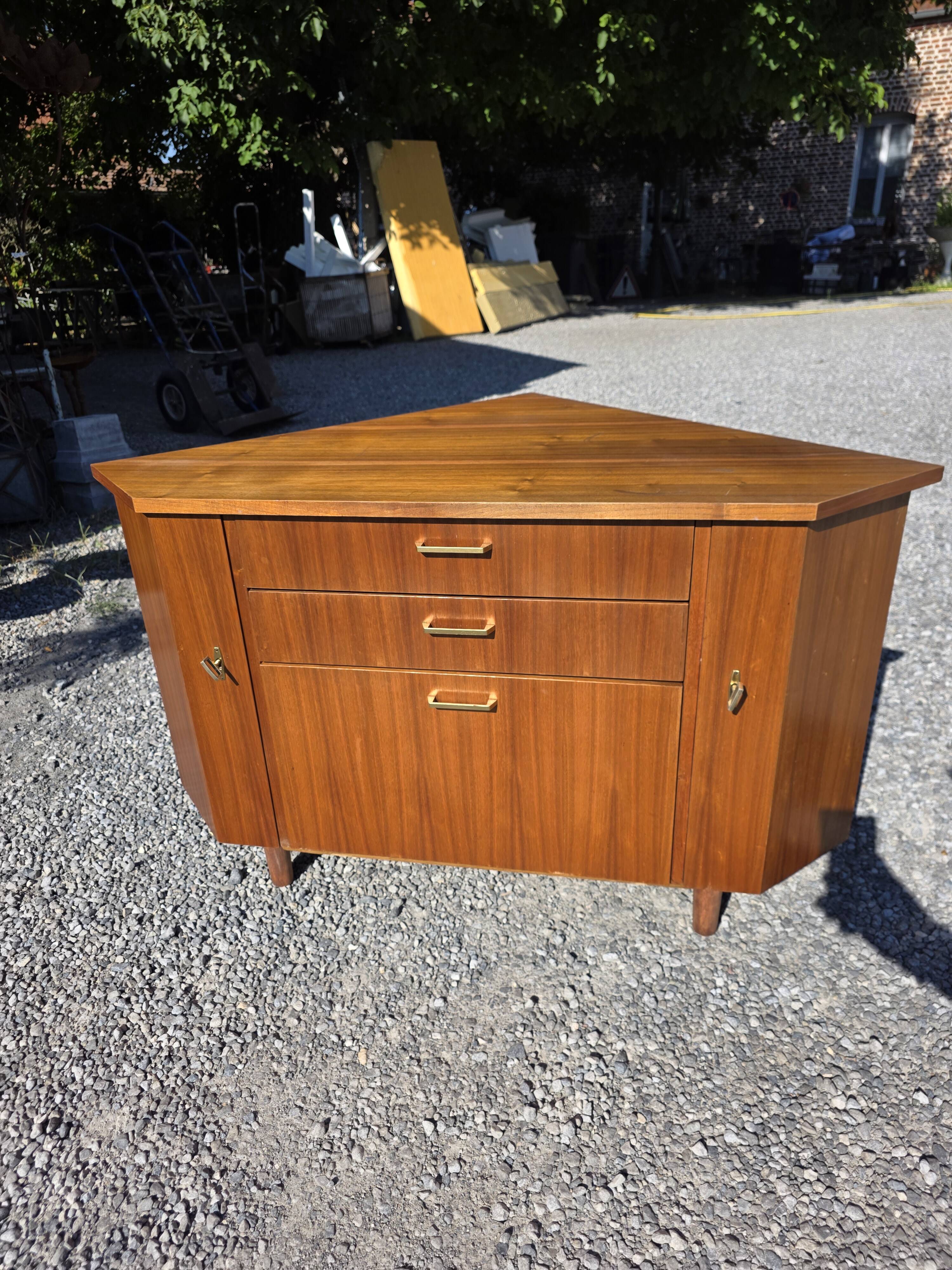Scandinavian corner unit in teak from the 1960s.