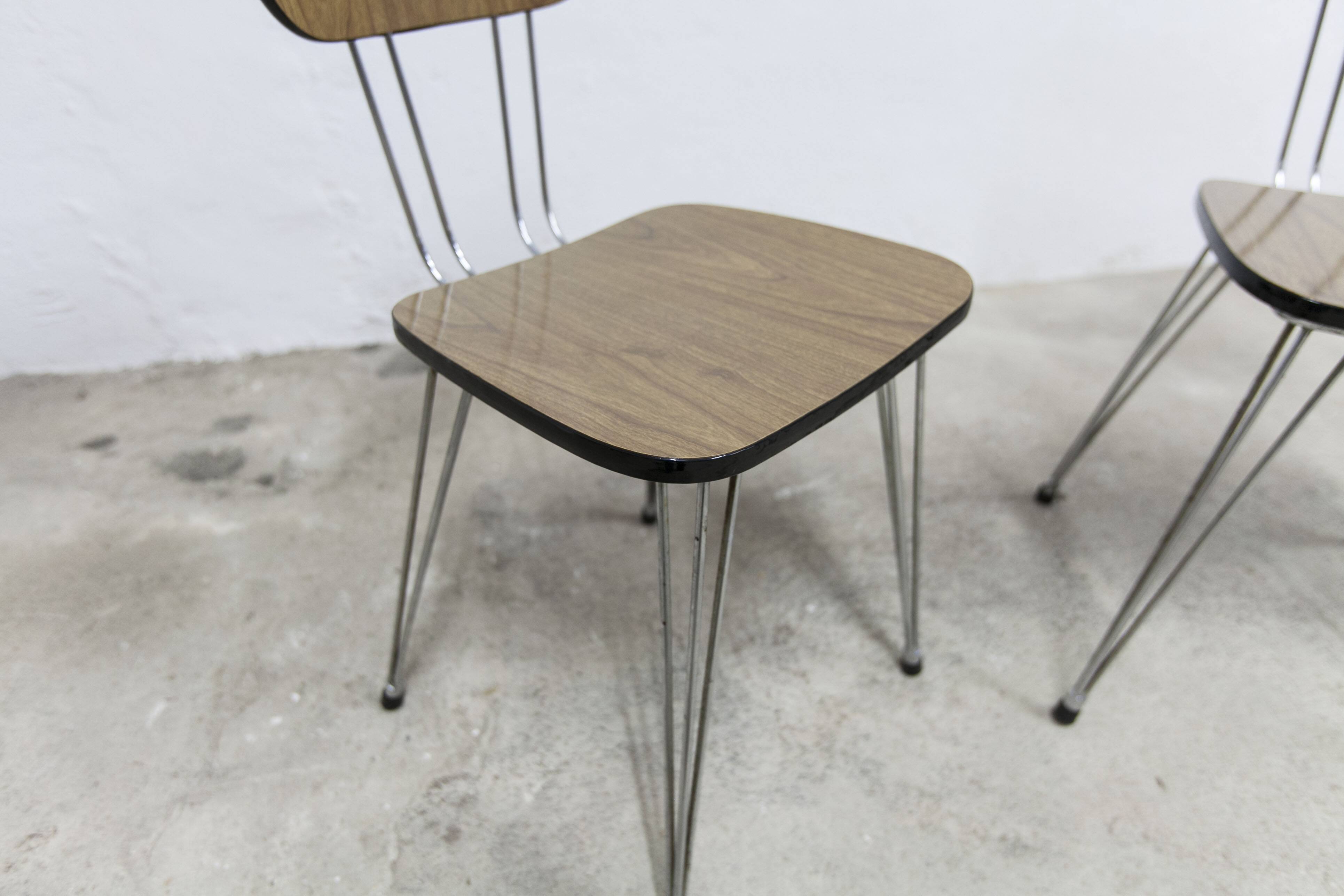 Pair of Formica 1970 brown Eiffel feet chairs