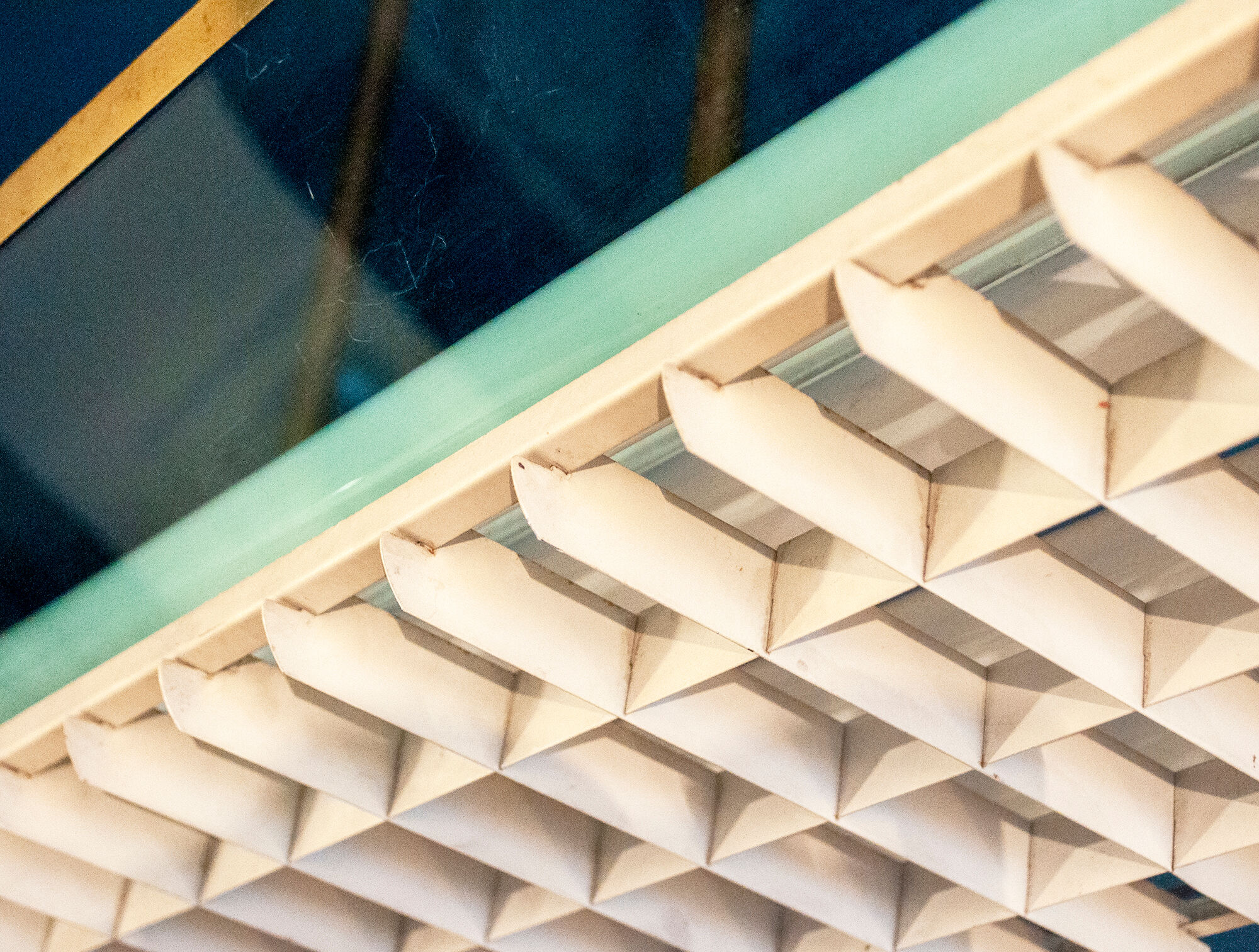 Four brass, aluminum and plexiglas ceiling panels. Italy 1950s