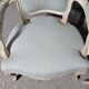 Pair of Louis XV style armchairs in patinated wood, light blue fabric.