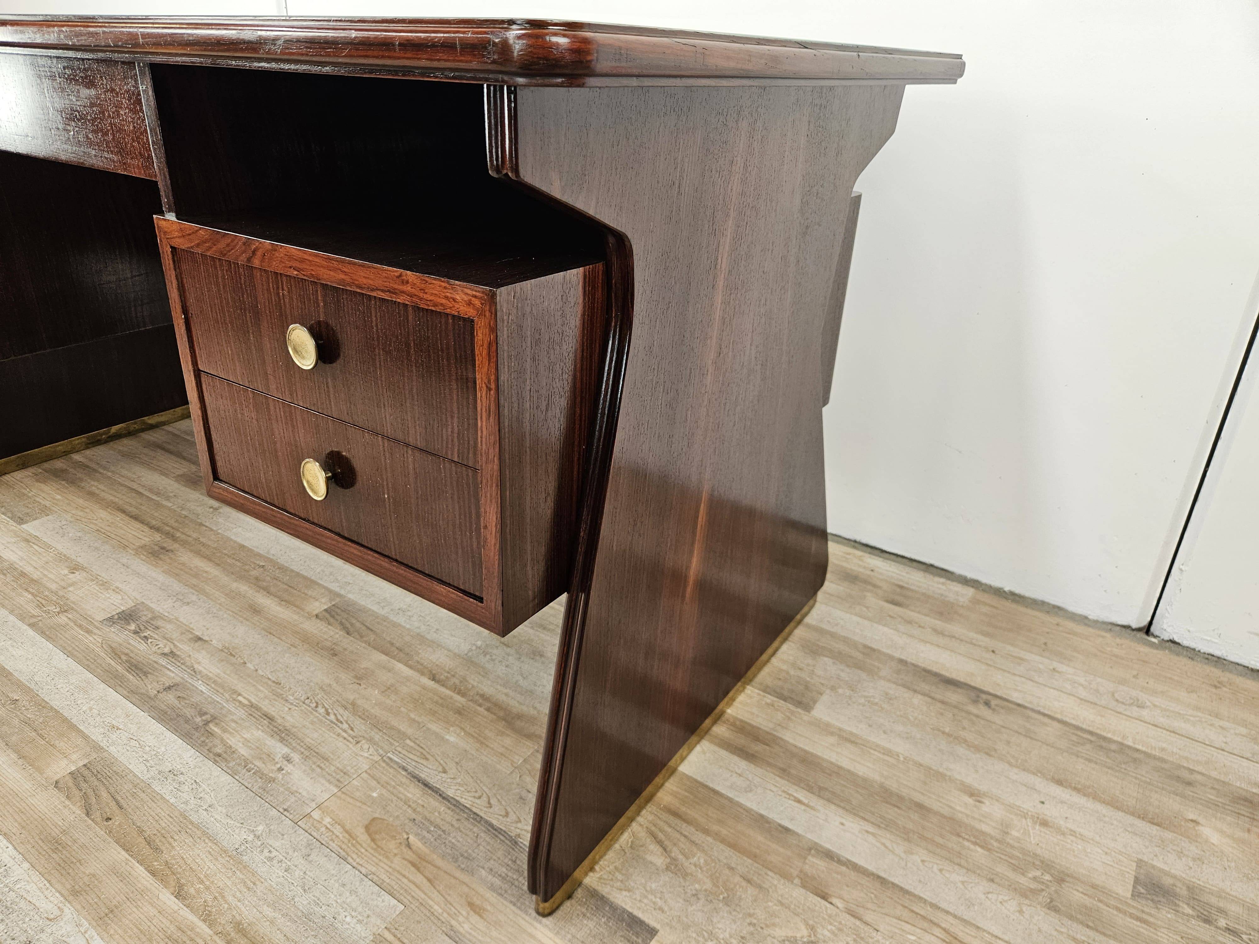 Executive Art Decò desk in exotic wood, glass, and brass