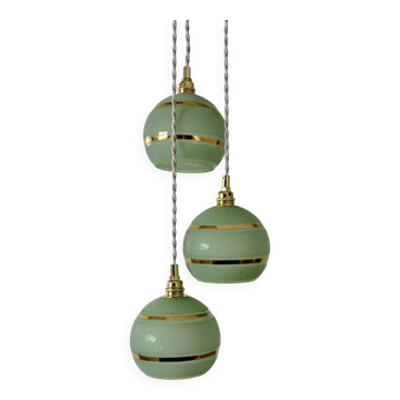 Suspension triple vintage glass globes in frosted green and gold.